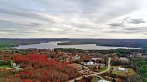 Aerial Residential Town Distant Lake in Auburn, NH