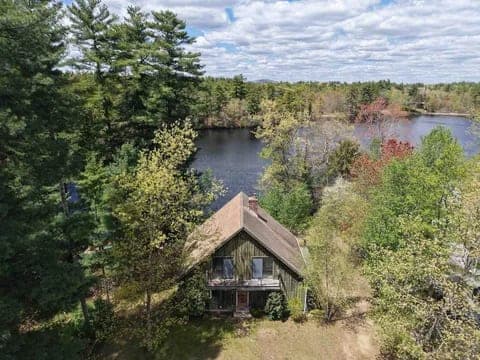 Mix of mid-century homes near the river and newer subdivisions deeper in town in Hudson, NH