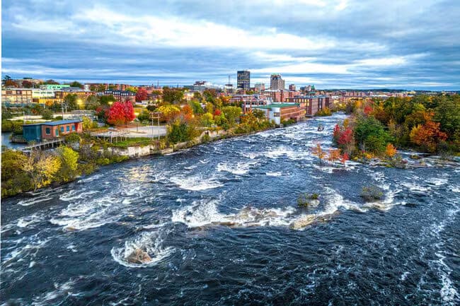 Aerial Merrimack River Rapids Downtown Skyline in Manchester, NH