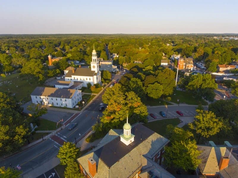 Aerial Golden Hour Common White Church Steeple in Reading, MA