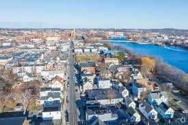 Aerial Winter Residential Street Toward Merrimack River in Lawrence, MA